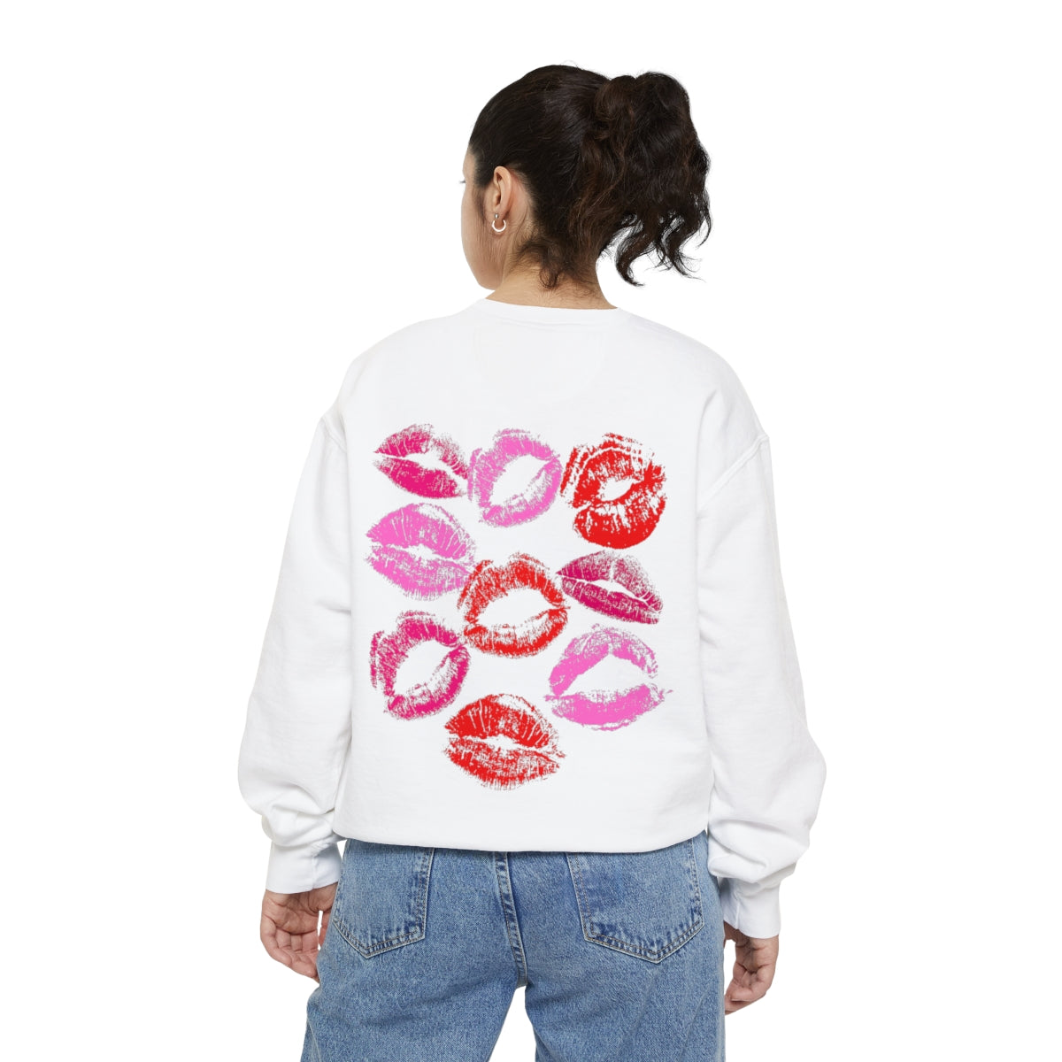 white crewneck sweatshirt with several decorative lipstick marks